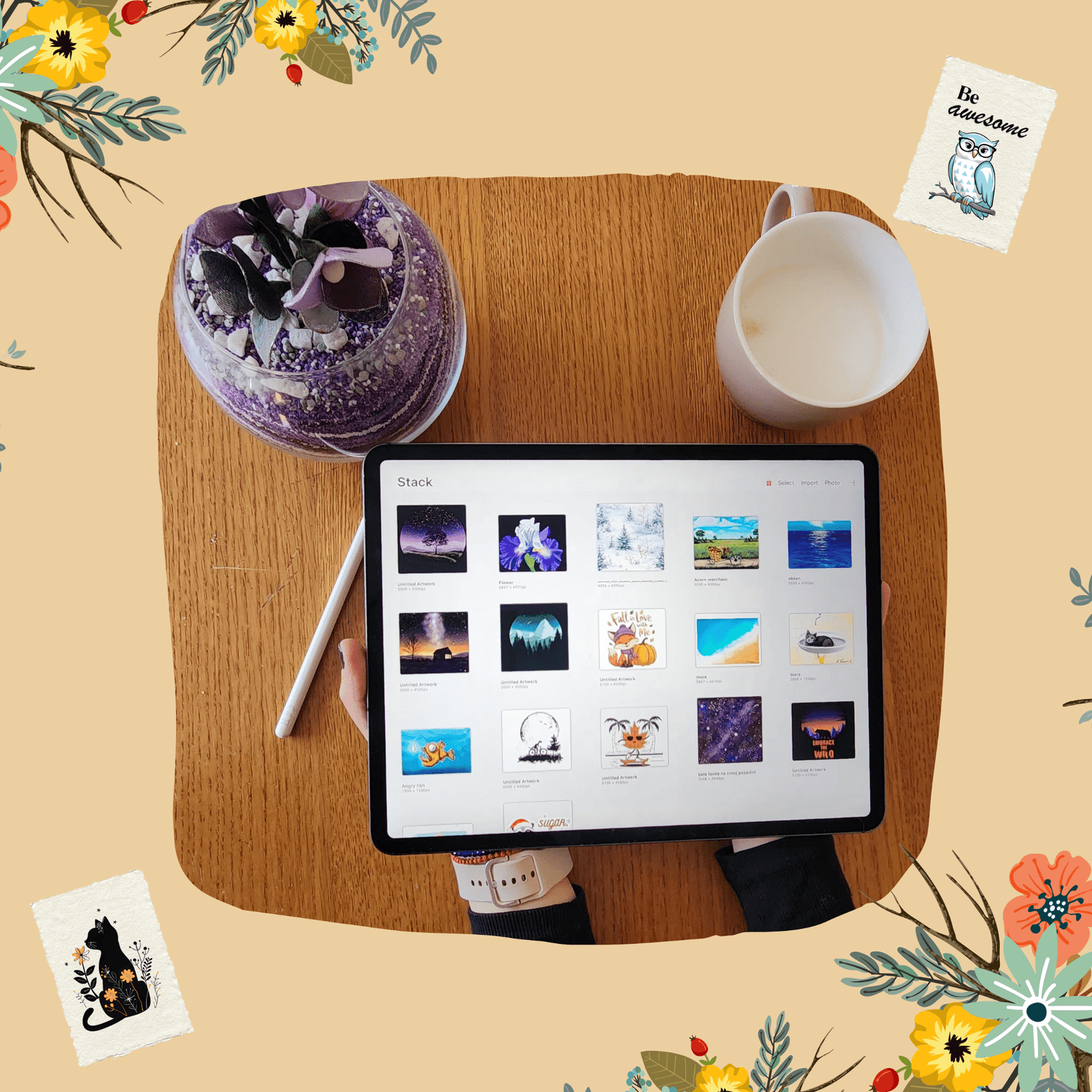 Flat lay of digital workspace with tablet, coffee cup, and floral frame