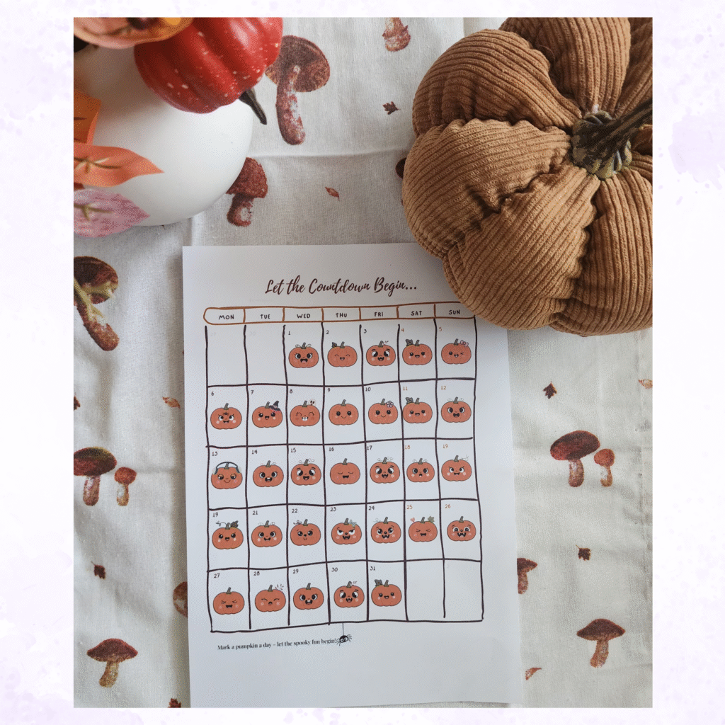 Halloween Cozy Kit printable countdown page with 31 illustrated pumpkins to mark each day of October, styled with cozy fabric, fall pumpkins, and autumn decor.